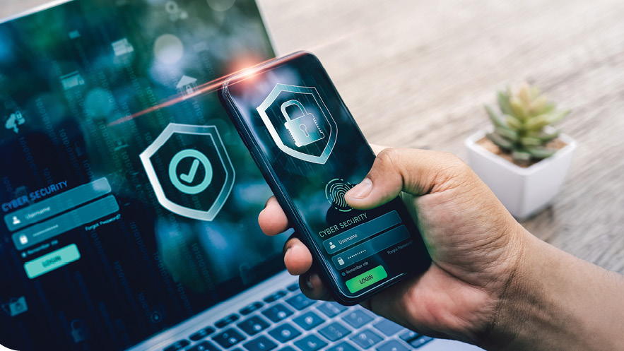 Cybersecurity controls displayed on a smartphone and laptop